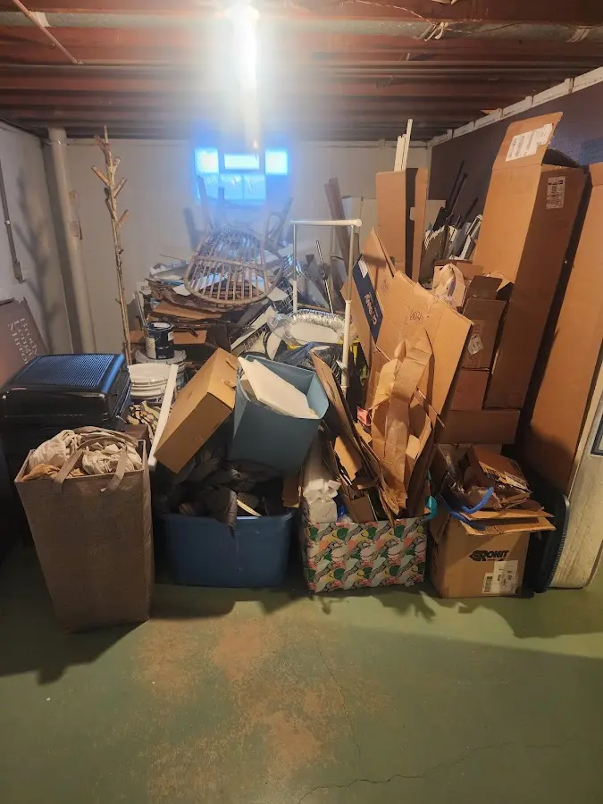 Roll-off dumpster container at job site for 2 Yard Dumpster Rental in Madison